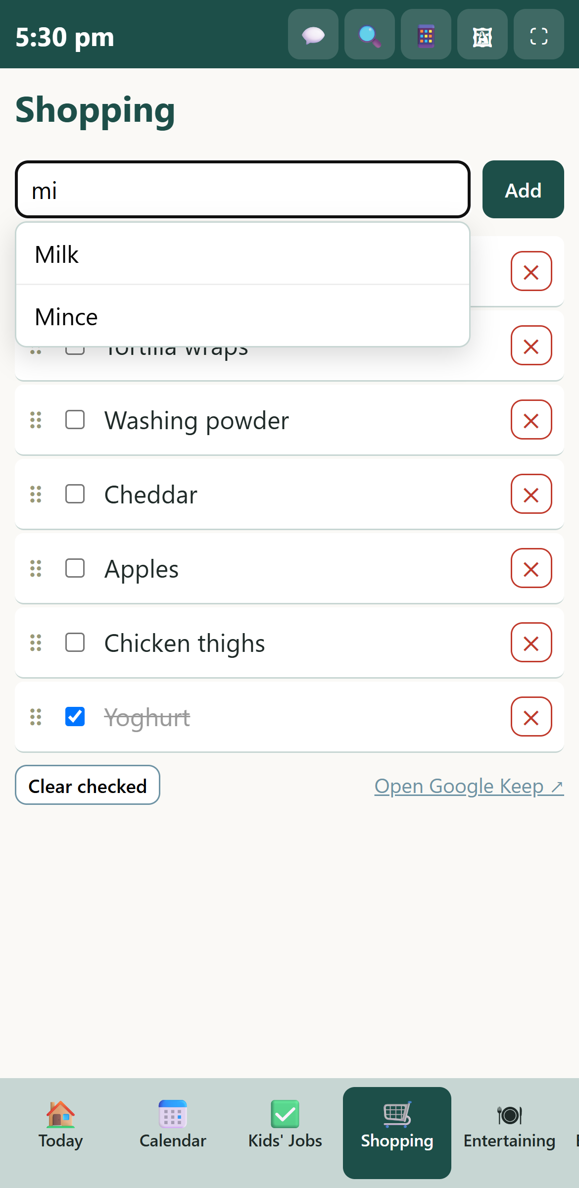 The shopping list on a phone, suggesting Milk and Mince as you type "mi"